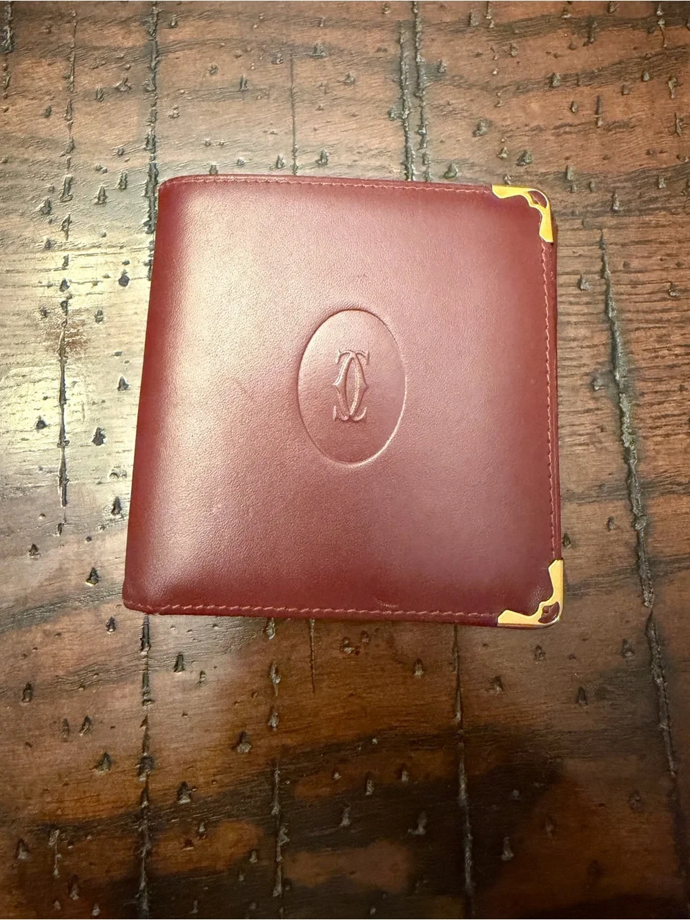 Cartier Men's Bifold Wallet in Burgundy with Gold Corners
